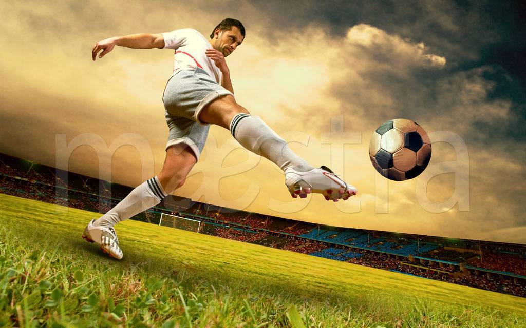 Фотообои Футболист бьет по мячу